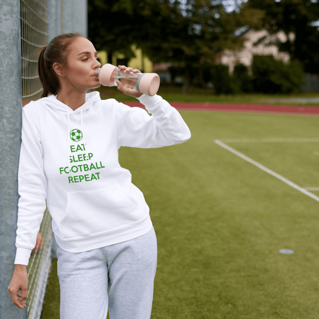 Witte hoodie met 'Eat, Sleep, Football, Repeat' bedrukking